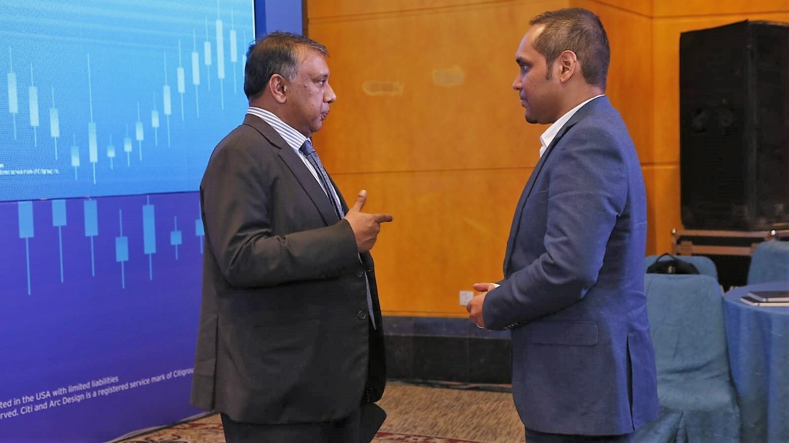 Bijon Islam speaking to Citibank CEO during the Bangladesh Treasury and Trade Solutions Roundtable Discussion